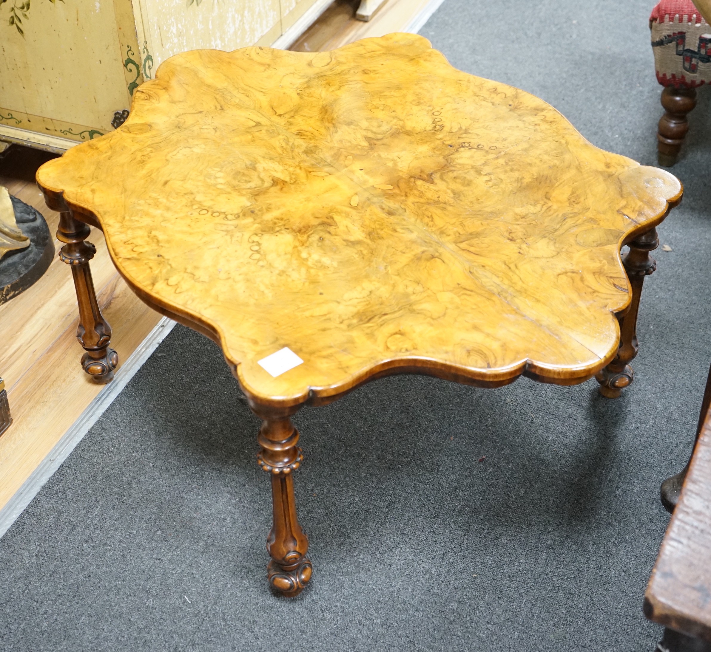 A Victorian burr walnut quarter veneered occasional table, width 93cm depth 70cm height 38cm